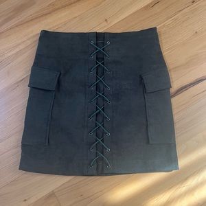 Olive green lace up mini skirt by Akira
